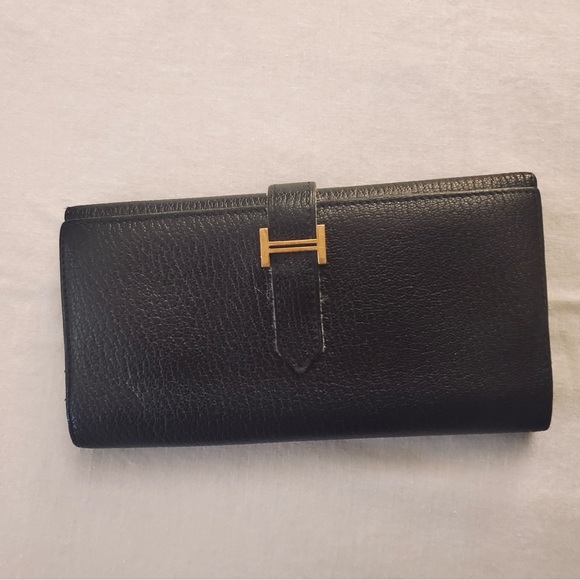 Hermes Handbags - Hermes Black Clutch with Gold Accent